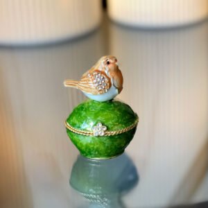 Image of round brown bird trinket box closed