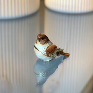 Image of small brown bird trinket box closed